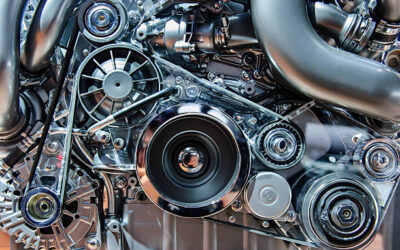 How to Extend the Life of Your Car Engine High-performance modern car engine close-up with visible pulleys, belts, and mechanical components